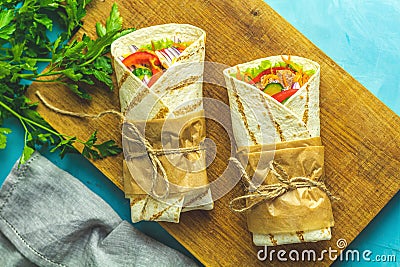 Shawarma, tacos al pastor, gyro or gyros. Traditional Middle Eastern snack Stock Photo