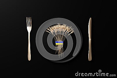 A sheaf of wheat on a black plate tied with the flag of ukraine. golden knife and fork, 3d rendering. concept of hunger and supply Stock Photo