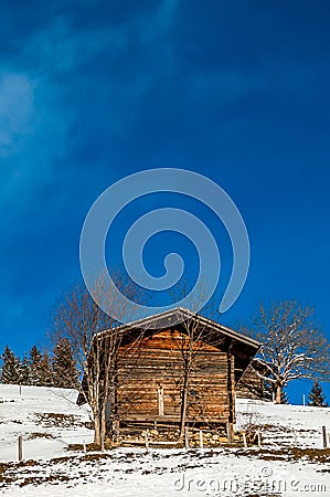 Shed in the snow, Switzerland Stock Photo