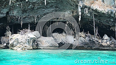 Sheer cliffs, blue water and a Viking cave. Phi Phi Islands, Thailand. Stock Photo