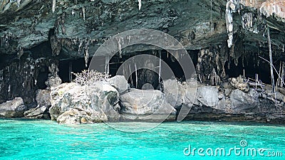 Sheer cliffs, blue water and a Viking cave. Phi Phi Islands, Thailand. Stock Photo