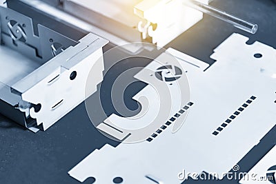 The sheet metal work pieces in the light blue scene. Stock Photo