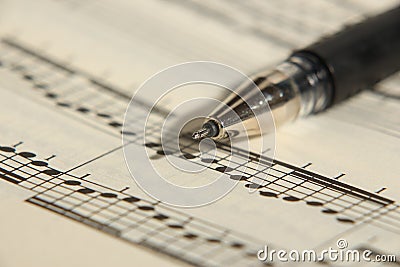 Sheet music and pen Stock Photo