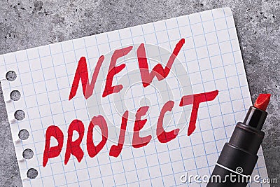 A sheet of paper with text and a pen on the table, top view. Concept on the topic of creating a new project Stock Photo