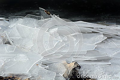 Sheets of broken lake glass Stock Photo