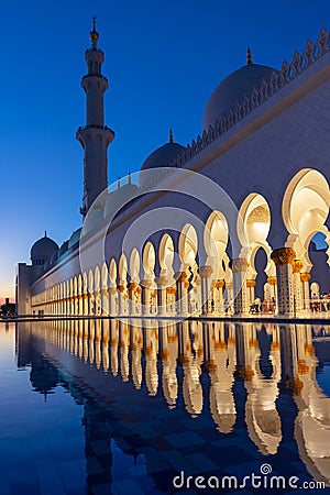 Sheikh Zayed Grand Mosque in Abu Dhabi near Dubai illuminated at night, UAE Stock Photo