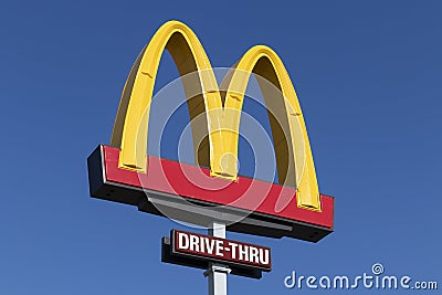 McDonald`s Restaurant. McDonald`s is offering delivery and drive thru service during social distancing Editorial Stock Photo