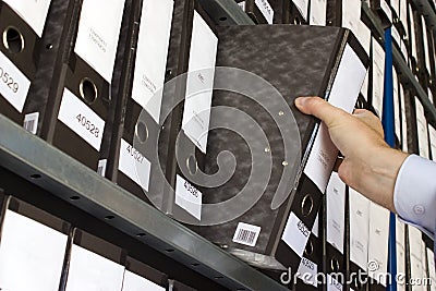 Shelf with Folders Stock Photo