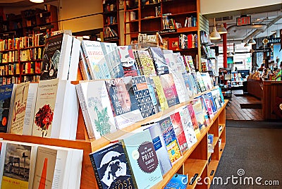 A shelf full of novels at a bookstore Editorial Stock Photo