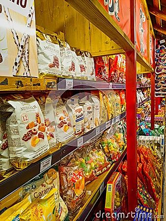 A shelf full of snacks in an Asian grocery store Editorial Stock Photo