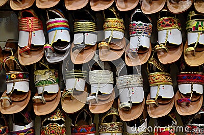 Shelf of leather hand made colorful Pakistani sandal shoes s Karachi Pakistan Editorial Stock Photo