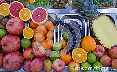 Shelf with ripe fruits Stock Photo