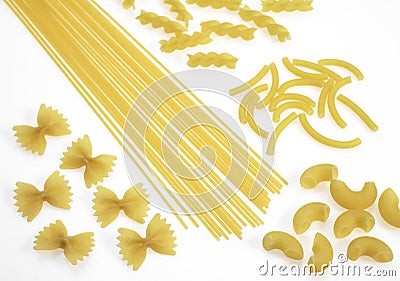 Shells, Macaroni, Spaghetti, and Twisted Pasta Against White Background Stock Photo