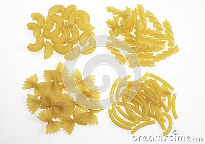 Shells, Macaroni, Spaghetti and Twisted Pasta Against White Background Stock Photo