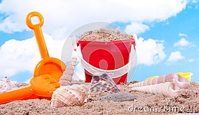 Shells and plastic beach toys Stock Photo