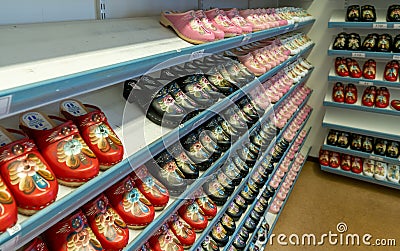 Shelves of colorful Swedish Dala clogs in a souvenir boutique Editorial Stock Photo