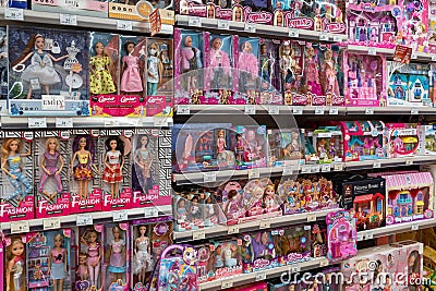 Shelves with dolls for children in a toy store. Minsk, Belarus, 2023 Editorial Stock Photo