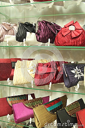 Shelves filled with ladies smart hand bags Stock Photo