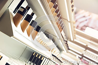 Shelves with makeup products in a cosmetics store Stock Photo