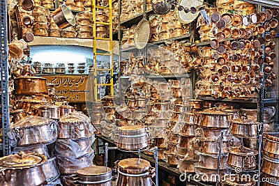 Shelvings with copper and brass utensils, cookware shop, Yazd, I Stock Photo