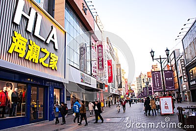 SHENYANG, CHINA - DEC 28, 2018: The center walking street zone in Shenyang`s downtown Zhong jie, Middle Street in Shenyang Editorial Stock Photo