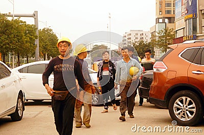 Shenzhen, China: construction workers Editorial Stock Photo