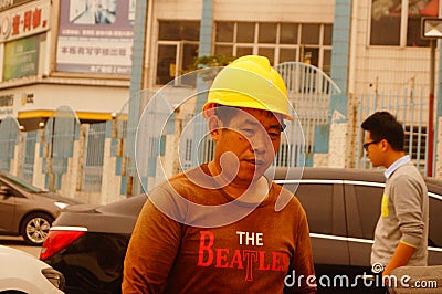 Shenzhen, China: construction workers Editorial Stock Photo