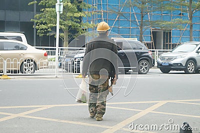 Shenzhen, China: construction workers Editorial Stock Photo