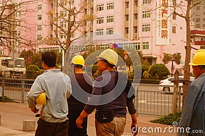 Shenzhen, China: construction workers Editorial Stock Photo