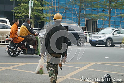 Shenzhen, China: construction workers Editorial Stock Photo