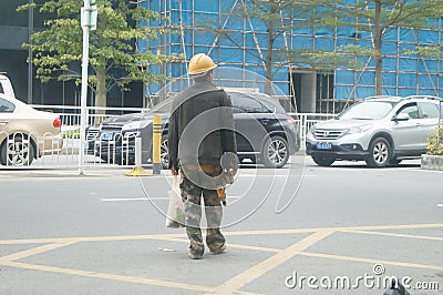 Shenzhen, China: construction workers Editorial Stock Photo