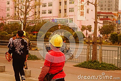 Shenzhen, China: construction workers Editorial Stock Photo