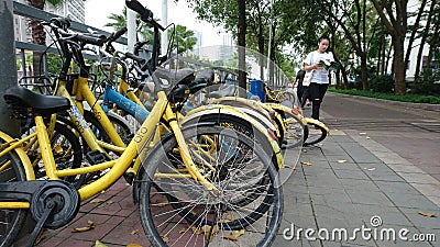 Shenzhen, China: the current situation of street bike sharing, some has been damaged Editorial Stock Photo