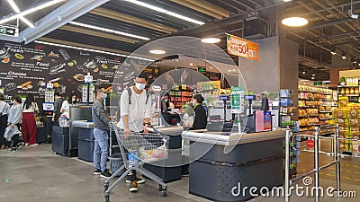 Shenzhen, China: after a decisive victory in the prevention and fight against the new coronavirus, supermarkets and restaurants re Editorial Stock Photo