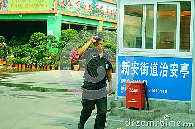 Shenzhen, China: male security guards on duty Editorial Stock Photo