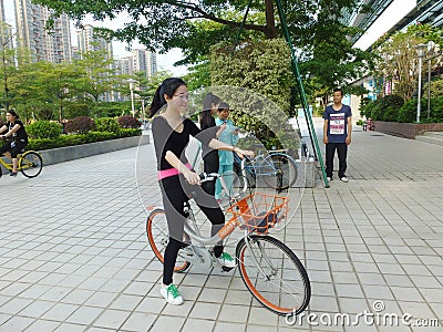Shenzhen, China: in the morning, women are exercising. Editorial Stock Photo
