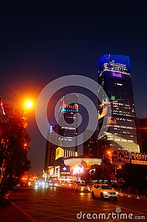 Shenzhen, China: night view of downtown bao `an, street and high-rise buildings and neon lights Editorial Stock Photo