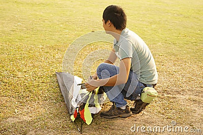 Shenzhen, China: people flying kites Editorial Stock Photo