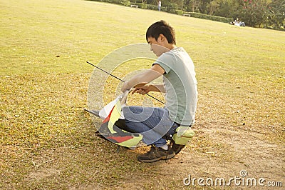 Shenzhen, China: people flying kites Editorial Stock Photo