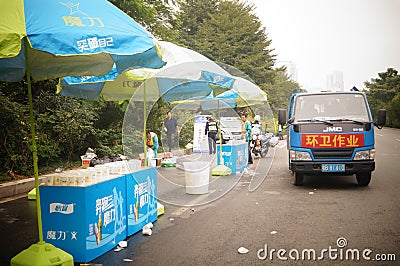 Shenzhen, China: sanitation workers clean sports venues Editorial Stock Photo