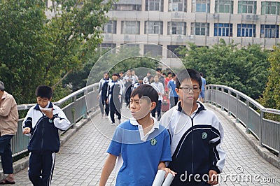 Shenzhen, China: students after school Editorial Stock Photo