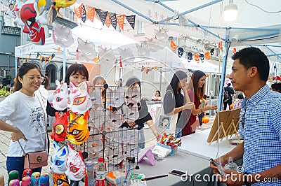 Shenzhen, China: window of the world eurostyle street holds a fair, selling masks popular with young women Editorial Stock Photo