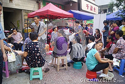 Shenzhen, China: women in health care Editorial Stock Photo