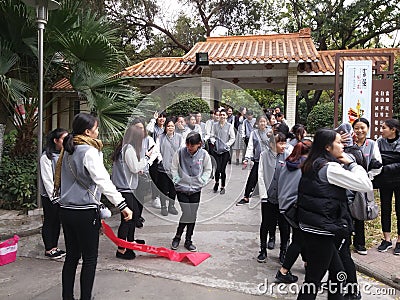 Shenzhen, China: young women employees are doing activities outdoors Editorial Stock Photo