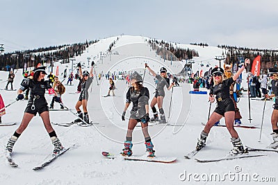 Sheregesh, Kemerovo region, Russia - April 03, 2021: Grelka Fest in Sheregesh. People in carnival costumes on the snow Editorial Stock Photo