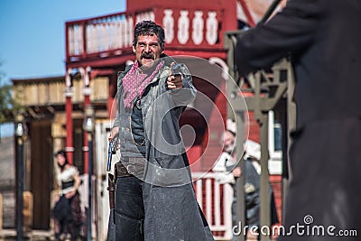 Sheriff Duels Bandit in Town Stock Photo