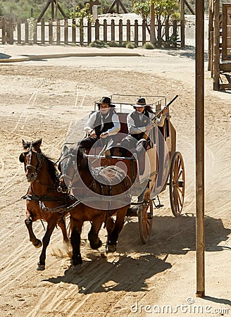 Sheriff and his Deputy on a stagecoach Stock Photo