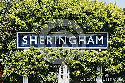 Sheringham station sign at a station in Sheringham, Norfolk, UK Editorial Stock Photo