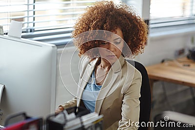 Shes a diligent worker. a beautiful young businesswoman sitting in her office. Stock Photo