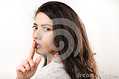 Shh secret confidential woman serious shushing Stock Photo
